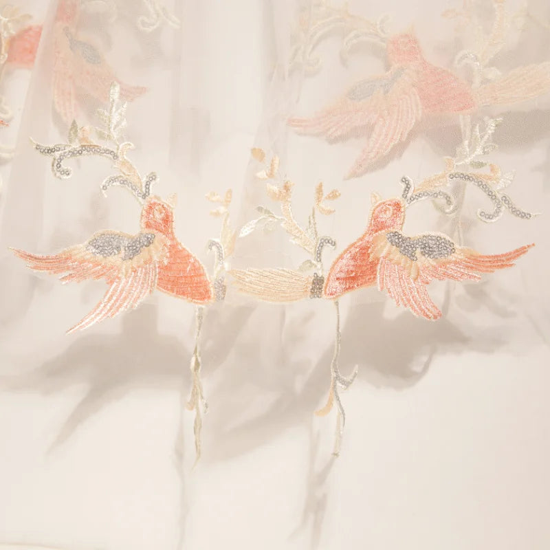 Embroidered sheer cape