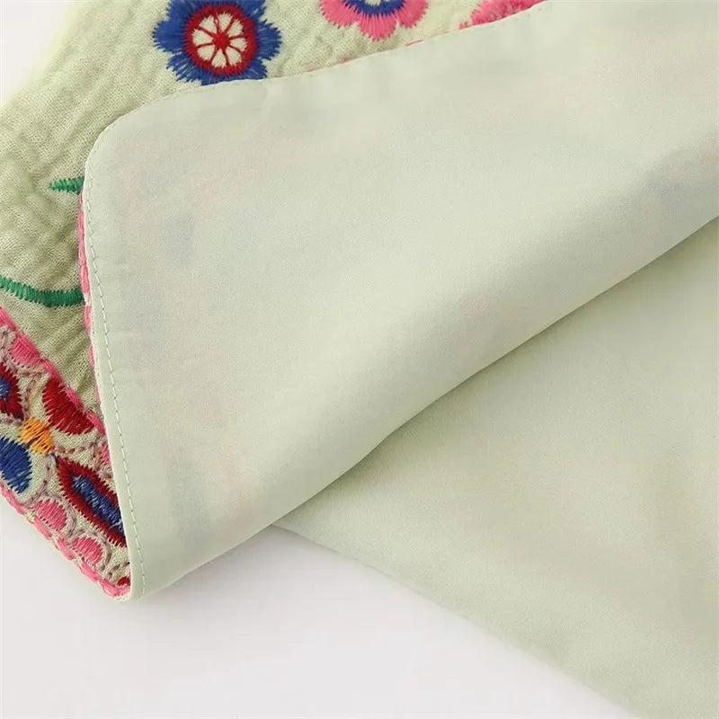 Open front floral vest