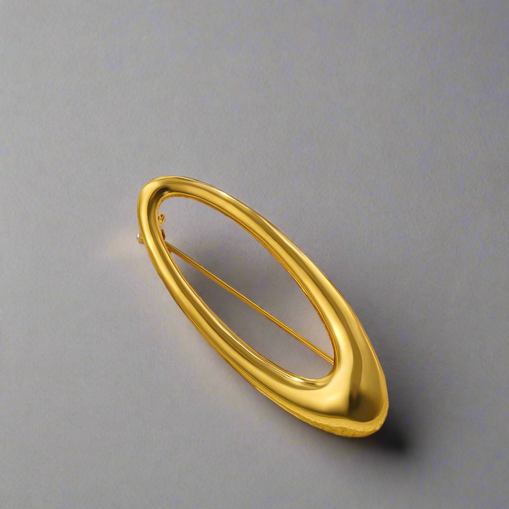 Geometric gold-plated brooch
