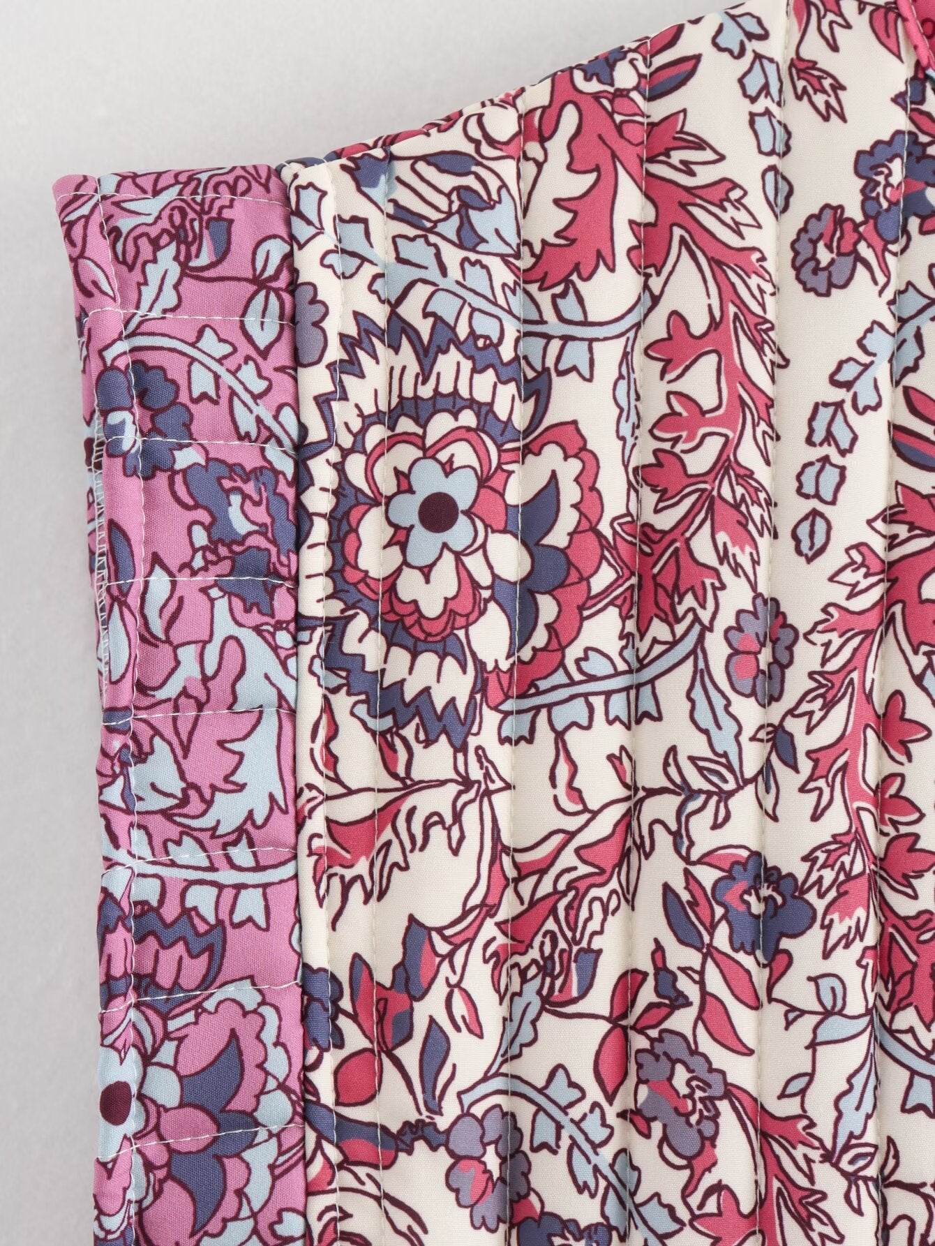 Floral print quilted vest